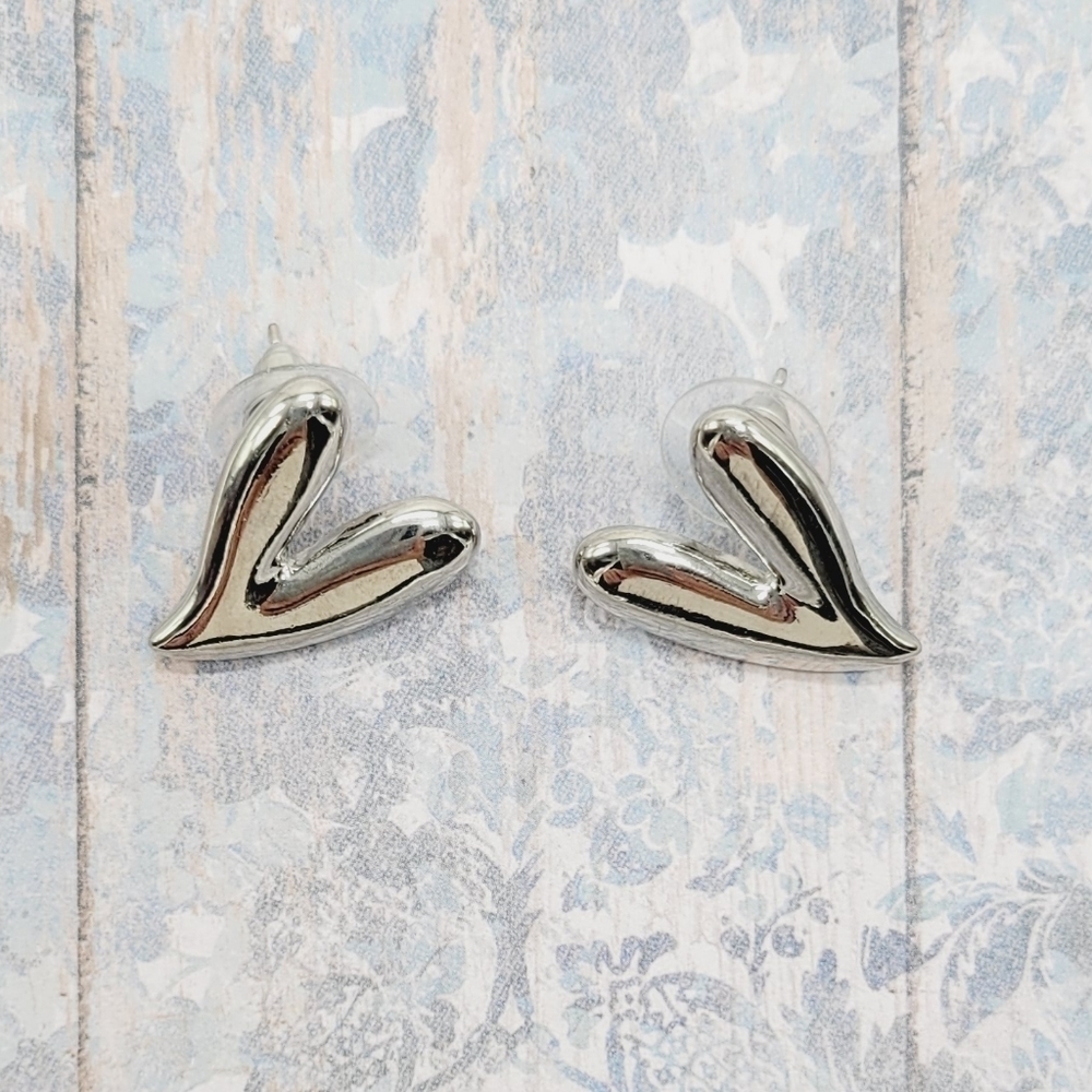 Silver heart shape small stud earrings